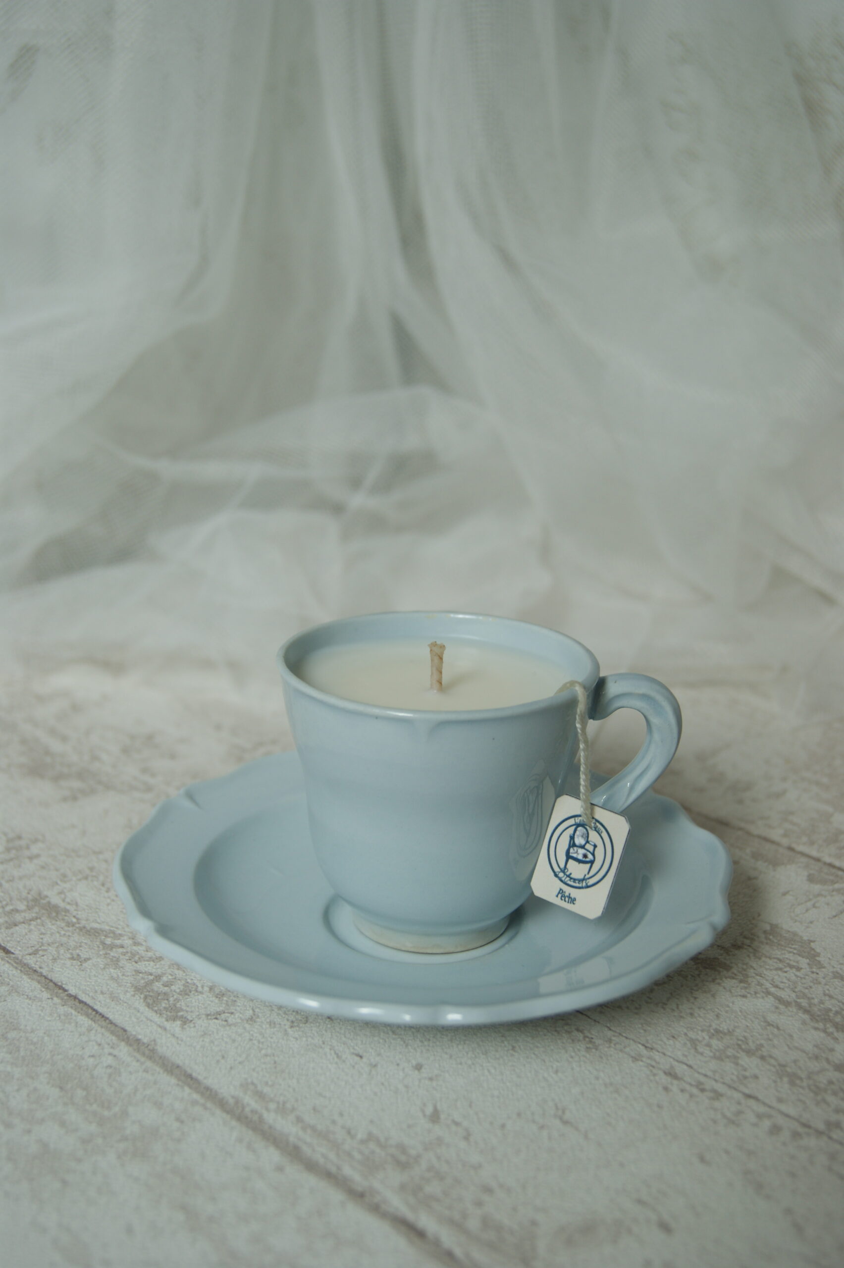bougie senteur peche dans tasse ancienne de seconde main en france